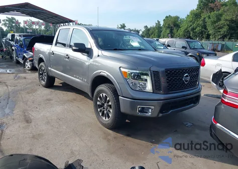 2019 Nissan Titan Pro-4X из США, поврежденный, VIN 1N6AA1E58KN520526